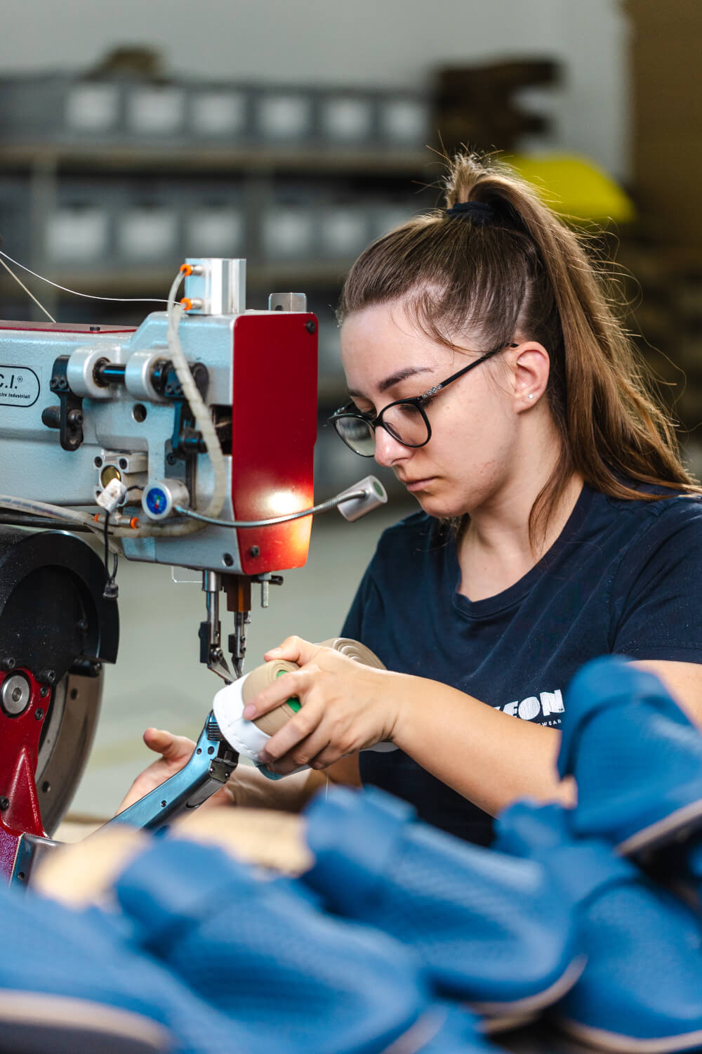 Stitching blue leather clogs